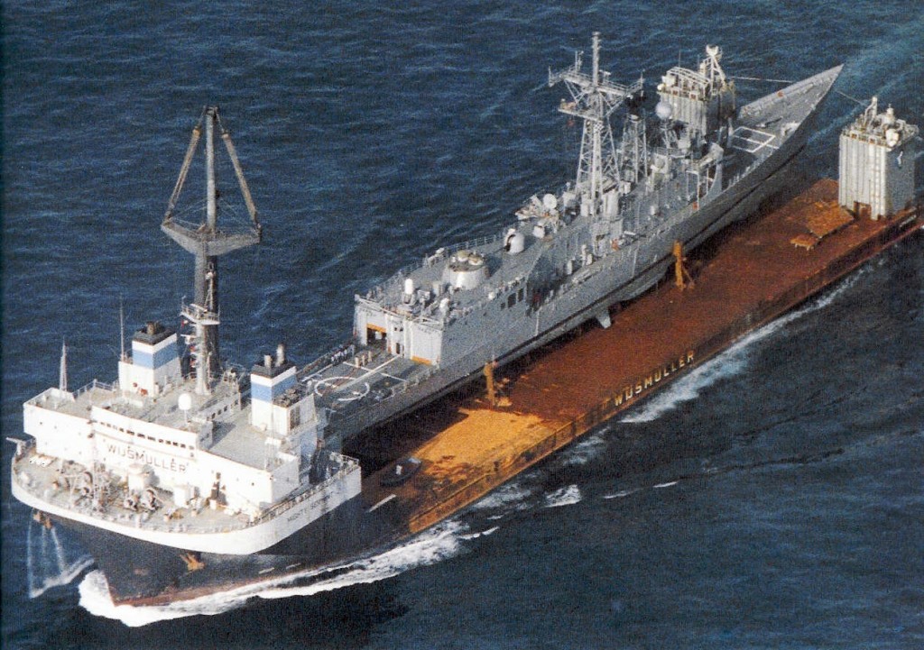 The heavy-lift ship MV Mighty Servant bears the damaged USS Samuel B. Roberts (FFG 58) on the journey from Dubai to Newport, R.I. (U.S. Navy photo)