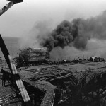 The main building of the Iranian Sassan oil platform burns after being hit by a BGM-71 Tube-launched, Optically-guided, Wire-guided (TOW) missile fired from a Marine AH-1 Cobra helicopter. The attack was part of Operation Praying Mantis which was launched after the guided missile frigate USS SAMUEL B. ROBERTS (FFG-58) struck an Iranian mine on April 14, 1988.