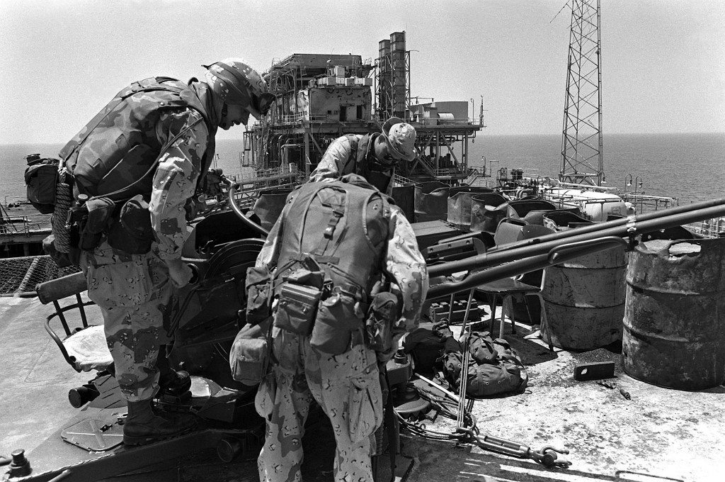 Marines inspect a ZU23 23mm automatic antiaircraft gun on the Iranian