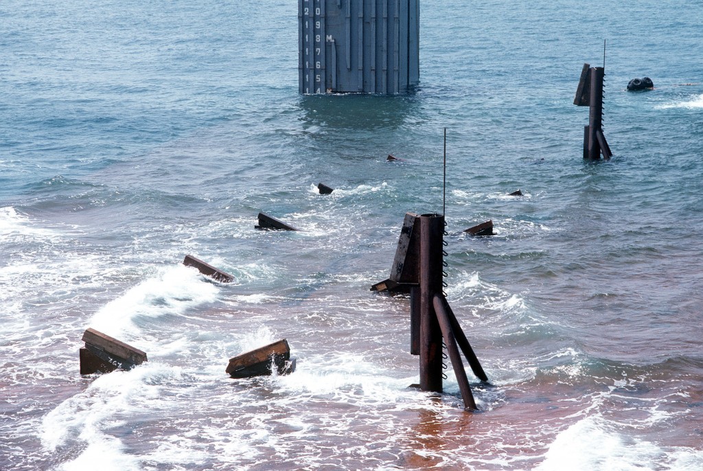 The blocking cradle that will hold Roberts disappears as Mighty Servant 2 takes on water and sinks. (U.S. Navy photo by PH2 Michael Harnar)