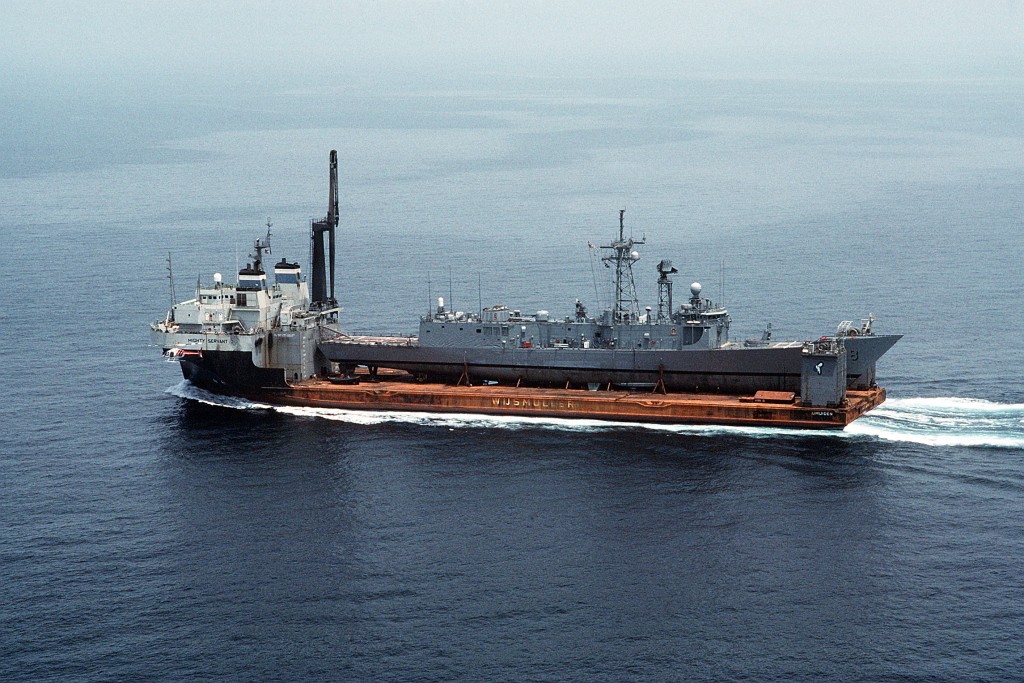 With a skeleton crew of about 40 sailors aboard, <i>Roberts</i>departs UAE waters, heading for the Strait of Hormuz on 1 July 1988. (PH2 Michael Harnar/U.S. Navy)