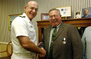 2002: Navy Times senior reporter John Burlage receives the Superior Public Service Award from Adm. Vern Clark, Chief of Naval Operations. (U.S. Navy photo)